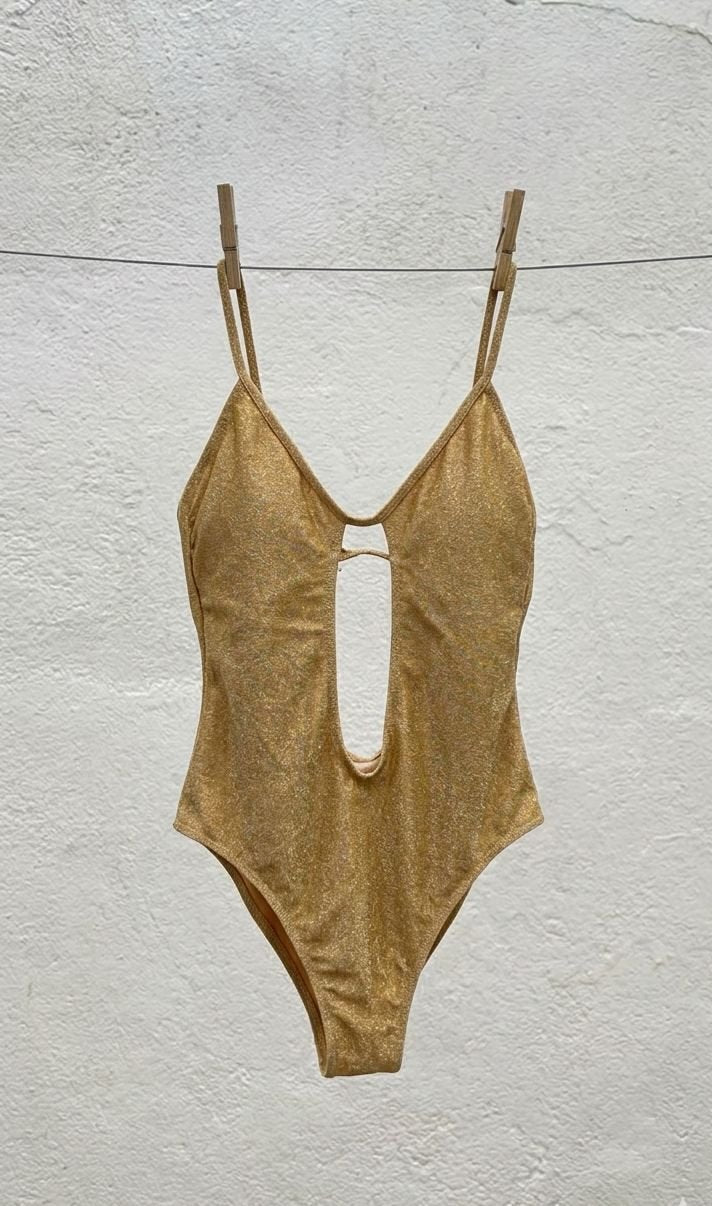 Costume intero oro lurex con scollo profondo e apertura centrale