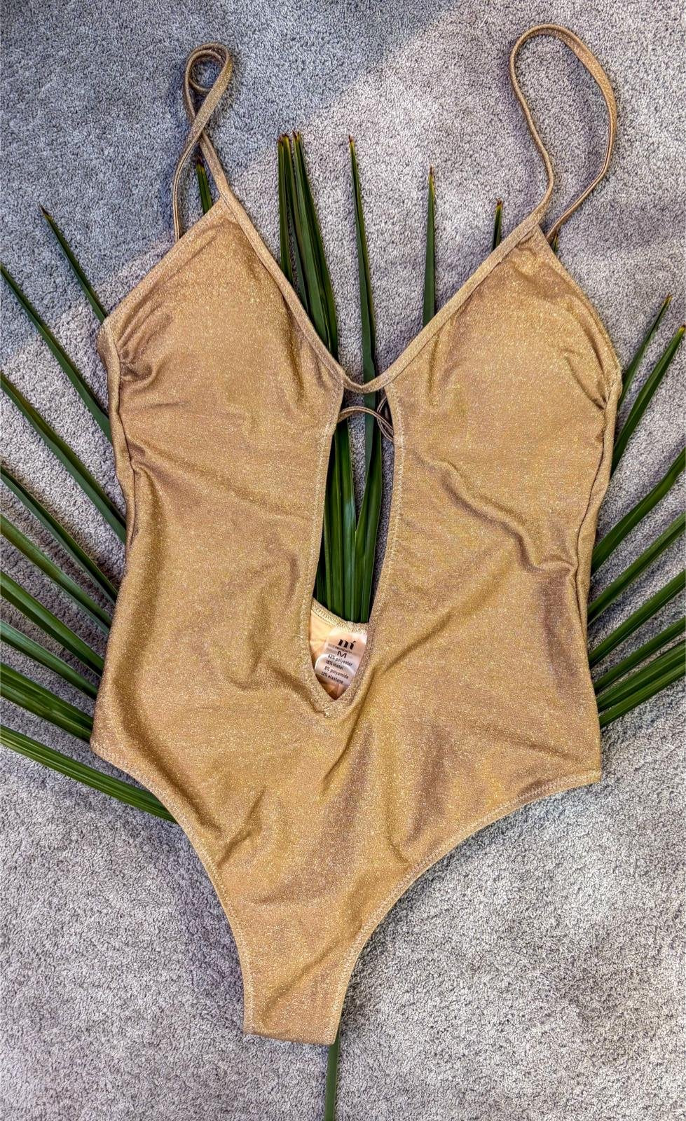 Costume intero oro lurex con scollo profondo e apertura centrale
